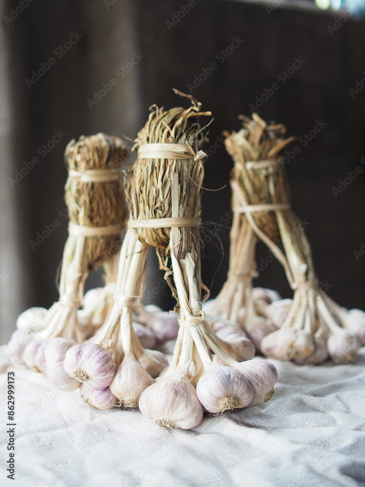 fresh garlic bundle and cooking in kitchen texture fresh garlic bundle and cooking in kitchen texture