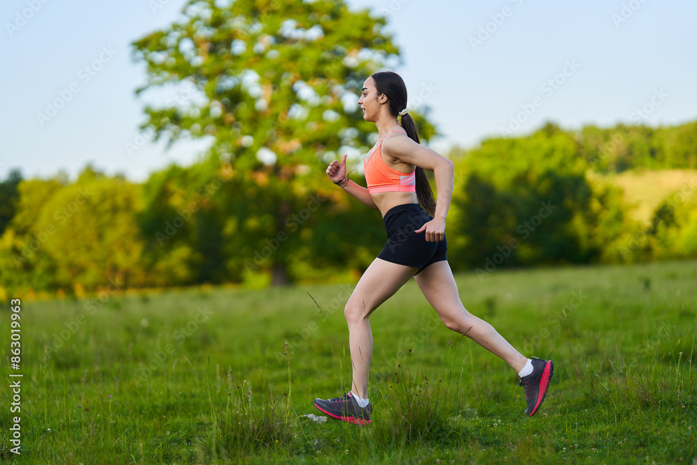 Latin girl running on a trail in the forest Latin girl running on a trail in the forest
