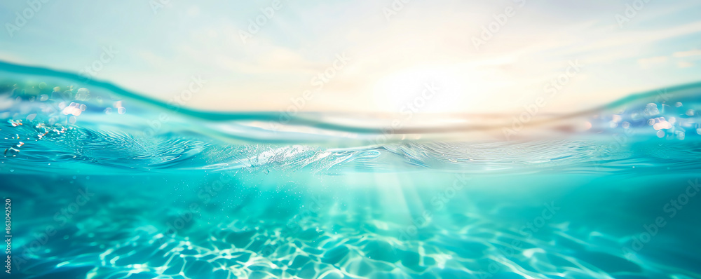 Tranquil underwater view with clear ocean, sparkling water, and bright sunlight, capturing the beauty of nature and marine environments. Tranquil underwater view with clear ocean, sparkling water, and bright sunlight, capturing the beauty of nature and marine environments.