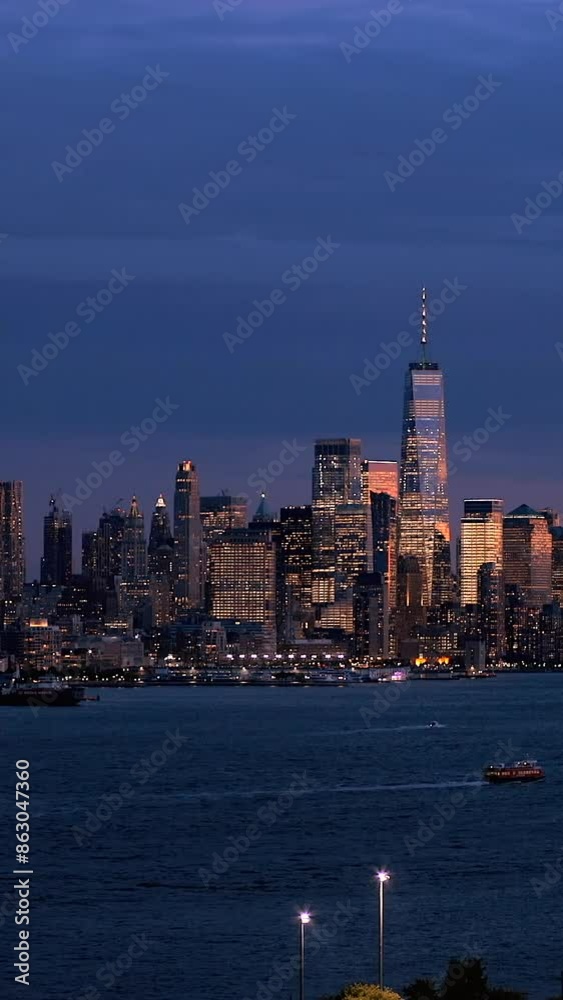 View of the Manhattan skyline at sunset from Hamilton Park. USA. Vertical video. View of the Manhattan skyline at sunset from Hamilton Park. USA. Vertical video.