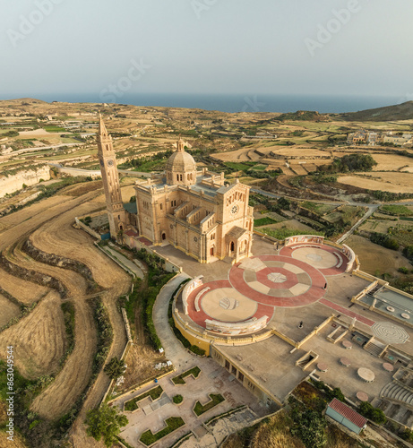 Aerial view of Bazilika Tal-Madonna Ta' Pinu Mill Gharb, church and countryside, Gozo, Malta. photo