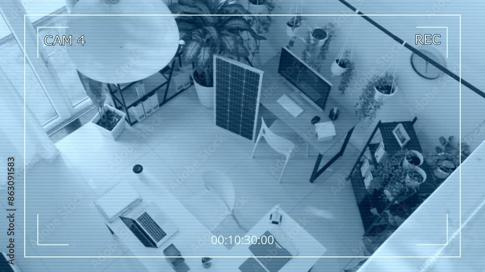Top down surveillance camera no people shot of alternative energy company office with working tables, solar panel and equipment for engineers Top down surveillance camera no people shot of alternative energy company office with working tables, solar panel and equipment for engineers