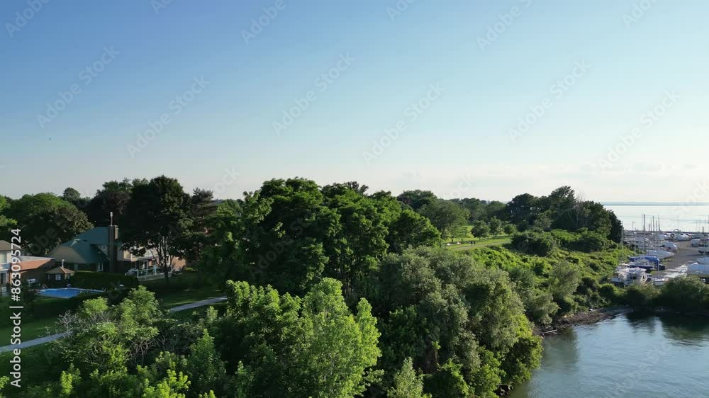 Aerial approach to Westcliffe Park near Port Dalhousie in St. Catharines, Ontario, Canada on a summer day in June, 2024. Aerial approach to Westcliffe Park near Port Dalhousie in St. Catharines, Ontario, Canada on a summer day in June, 2024.