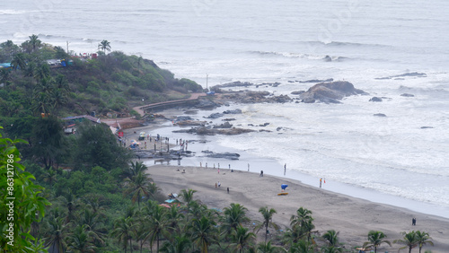 Beautiful view of crowd less or empty Vagator beach from chapora fort in in monsoon.