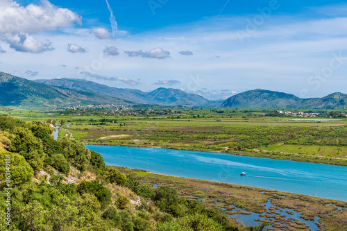 A view towards Shendelli across the strait at Butrint, Albania in summertime photo