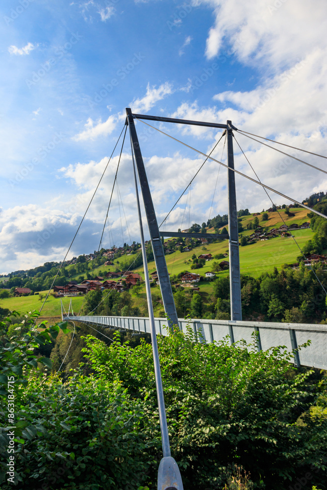 Suspension pedestrian panorama bridge over the Gummi gorge in Sigriswil, Switzerland Suspension pedestrian panorama bridge over the Gummi gorge in Sigriswil, Switzerland