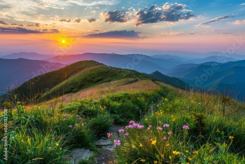 As I hike along the Appalachian Trail near the border of North Carolina and Tennessee at sunrise, I am treated to the lush summer landscape of Roan Mountain. photo