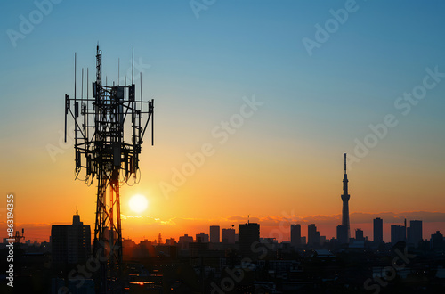 High-tech signal transmission tower against clear sky.