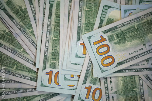 one hundred dollar bills. One hundred dollar bills. pile of one hundred US banknotes. Background with money American hundred dollar bills. 100 bills background. Lots of dollars. stamp with US dollar.