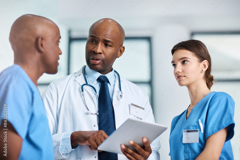 Doctor, tablet and team in hospital as mentor with support for patient, feedback and healthcare advice. People, tech and coaching with solution, teamwork and trust for wellness question at clinic Doctor, tablet and team in hospital as mentor with support for patient, feedback and healthcare advice. People, tech and coaching with solution, teamwork and trust for wellness question at clinic