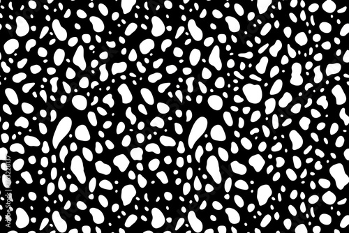 seamless hand drawn small dense polka dot animal spots pattern in white on black background abstract aboriginal dot art motif or organic cellular texture in a trendy doodle line art or linocut style