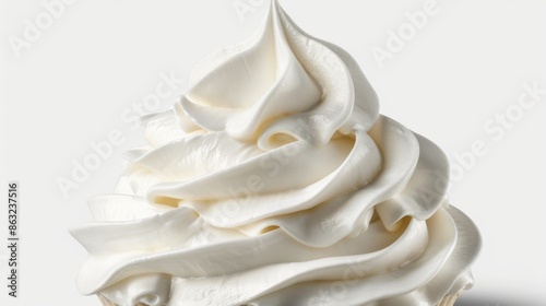 A close-up of a beautifully swirled dollop of whipped cream against a white background.