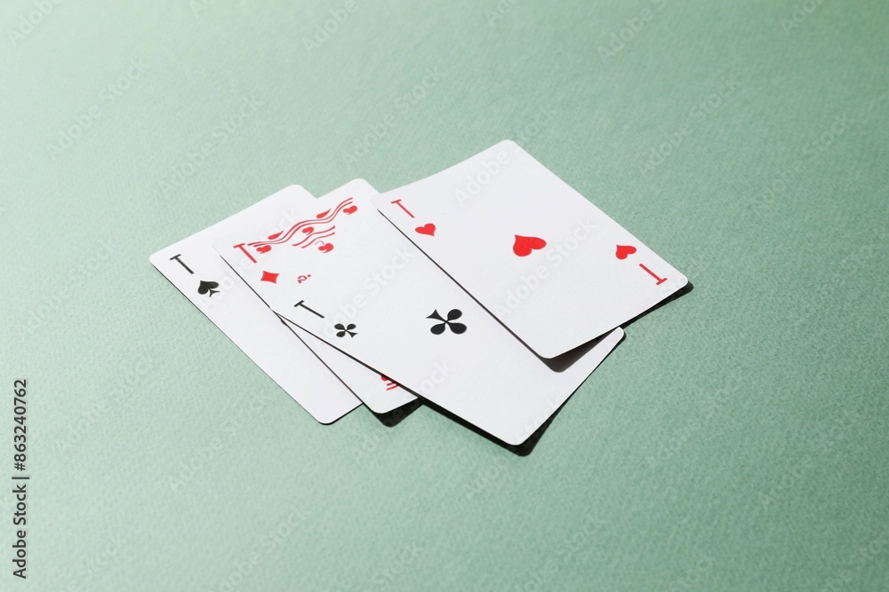 Playing cards on color background, top view. Gambling concept Playing cards on color background, top view. Gambling concept