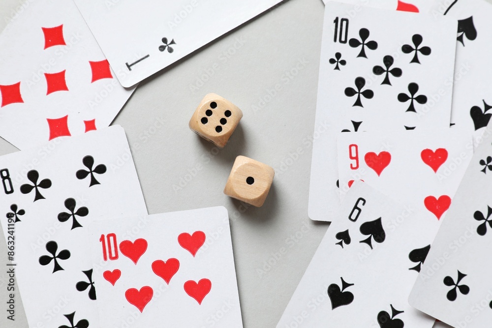 Playing cards on gray background, top view. Gambling concept Playing cards on gray background, top view. Gambling concept