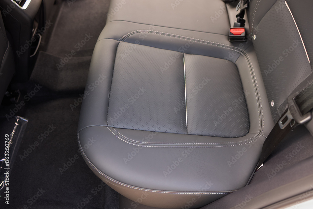 Car back seat with headrest and arm rest, a comfortable automotive fixture Car back seat with headrest and arm rest, a comfortable automotive fixture