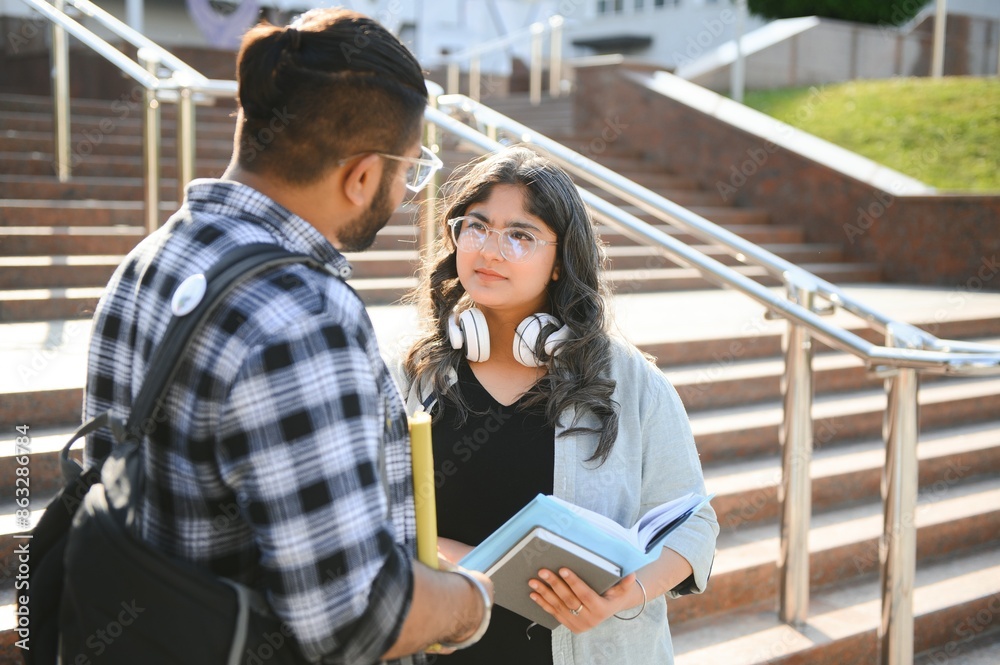 Group of Indian or Asian college students in the campus Group of Indian or Asian college students in the campus