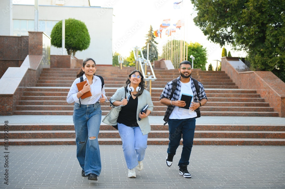 Fototapeta premium Group of smiling multiethnic near university campus