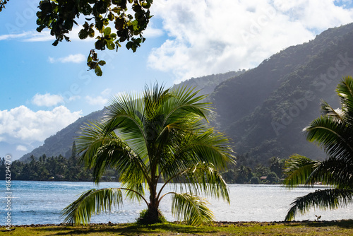 The beachfront park at Teahupoo, Tahiti - a world famous spot for surfing championships. The village of Teahupoo is known as “The end of the road” because the road from Papeete ends there.