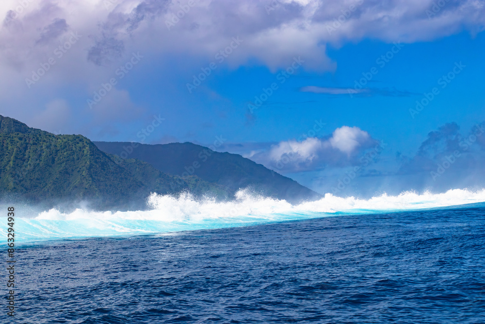 Monster waves at Teahupoo, Tahiti, French Polynesia - a world famous spot for surfing championships. The village of Teahupoo is known as “The end of the road” because the road from Papeete ends there. Monster waves at Teahupoo, Tahiti, French Polynesia - a world famous spot for surfing championships. The village of Teahupoo is known as “The end of the road” because the road from Papeete ends there.