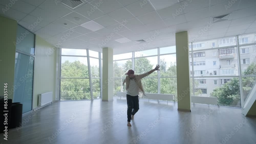 Man Breakdancing in Modern Studio Man Breakdancing in Modern Studio