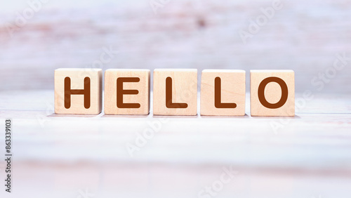 Communication concept, introduction. HELLO word assembled from wooden cubes