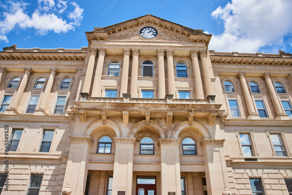 Huntington County Courthouse Facade with Corinthian Columns on Sunny Day Huntington County Courthouse Facade with Corinthian Columns on Sunny Day