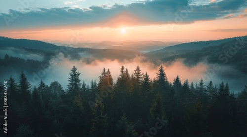 Sunrise Over Foggy Mountains In A Coniferous Forest