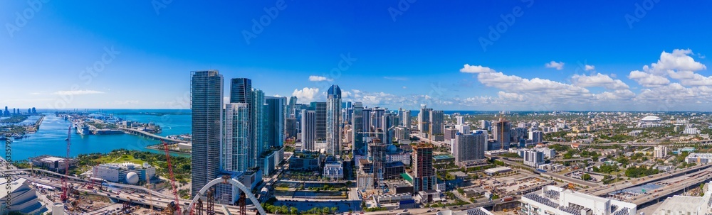 Obraz premium Aerial panoramic photo Downtown Miami, Florida, USA. stitched photo 2024. View of skyscrapers Dade County business district