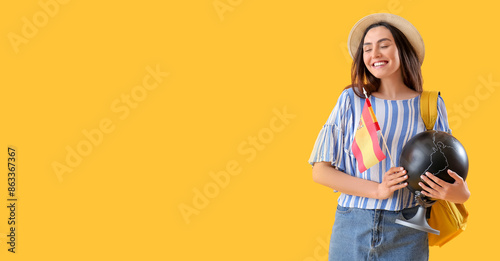 Young woman with flag of Sp...