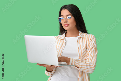 Young female programmer wor...