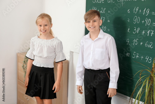 Little classmates in classr...