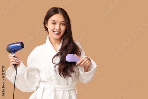 Beautiful young Asian woman...
