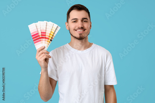 Young man with paint palett...