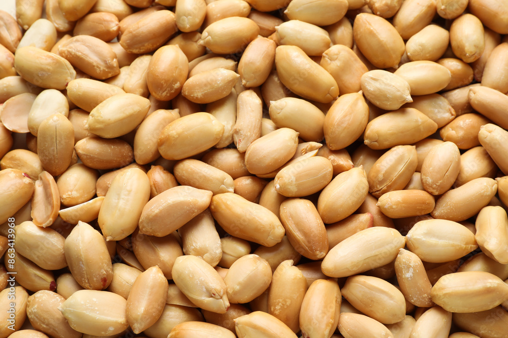 Fresh peeled peanuts as background, above view Fresh peeled peanuts as background, above view