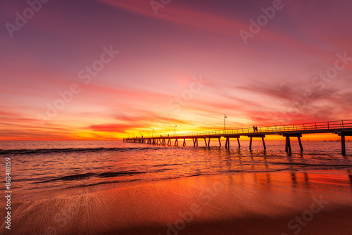 Jetty reaching out to the sea at sunset