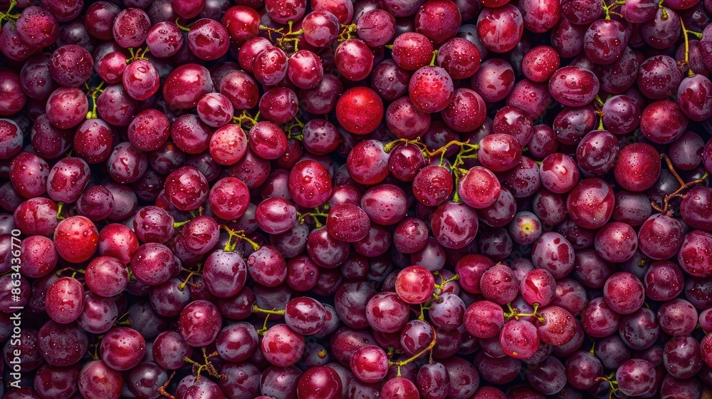 Freshly picked red grapes arranged in a pattern Close up with copy space top view Freshly picked red grapes arranged in a pattern Close up with copy space top view