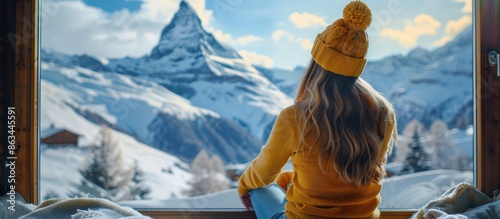 Woman Gazing at Majestic Mountain View photo