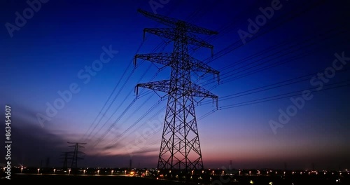 Motion shot of electricity pylon. Industrial background