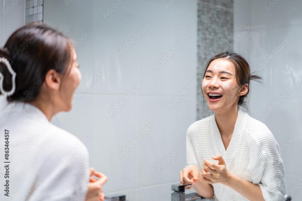 Asian beautiful woman putting smooth and skin care for facial soft. Asian beautiful woman putting smooth and skin care for facial soft.