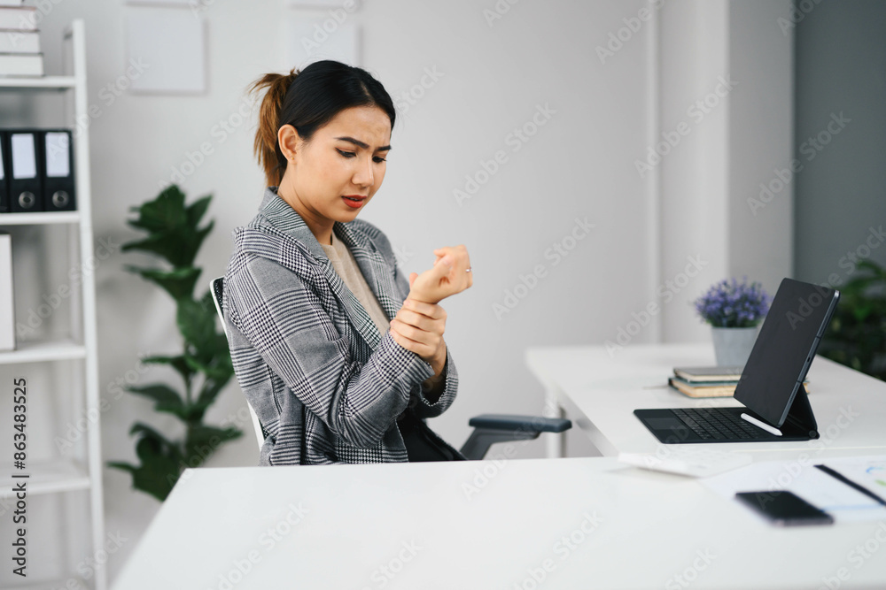 Professional Asian Business Woman Working in Modern Office Environment with Laptop and Documents Professional Asian Business Woman Working in Modern Office Environment with Laptop and Documents
