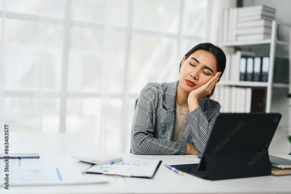 Professional Asian Business Woman Working on Laptop in Modern Office Environment Professional Asian Business Woman Working on Laptop in Modern Office Environment