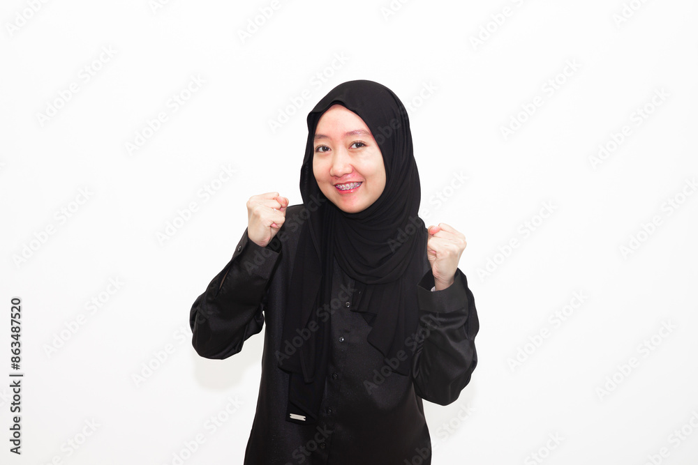 Beautiful and cheerful young Asian Muslim woman, with various expressions. isolated on white background Beautiful and cheerful young Asian Muslim woman, with various expressions. isolated on white background