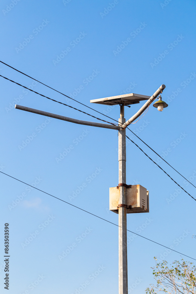 metal pole with common lights and cables with sky background metal pole with common lights and cables with sky background