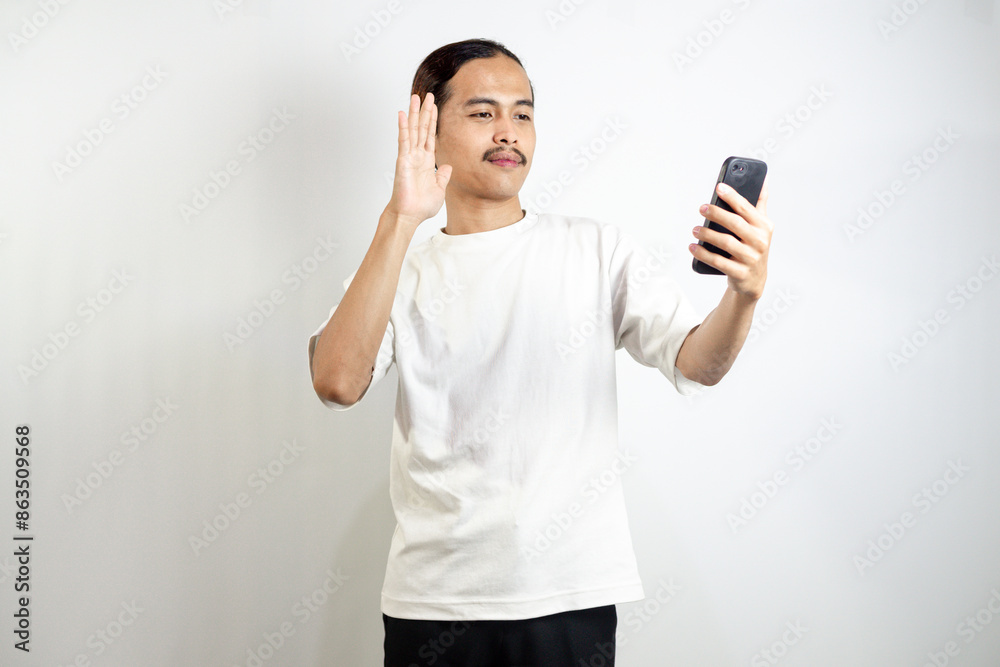Asian man with various expressions while holding mobile phone. isolated in white background Asian man with various expressions while holding mobile phone. isolated in white background