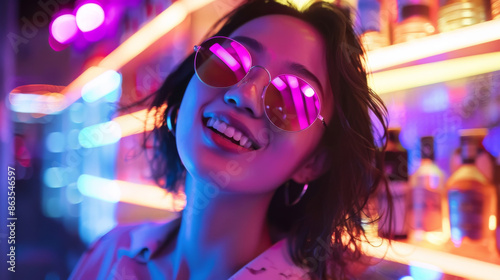 Asian female in a night club wearing sunglasses, young Korean woman in a nightclub © Keitma