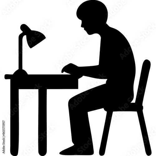 student  is sitting at a desk 