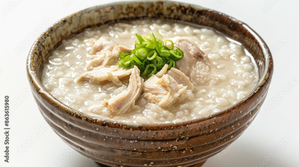 Close up photograph of chicken porridge on a white background Close up photograph of chicken porridge on a white background