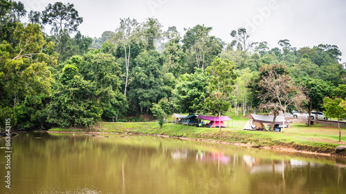 Tourists set up tents to relax in Khao Yai National Park, a World Heritage forest in Thailand, 10 June 2024. © Chay