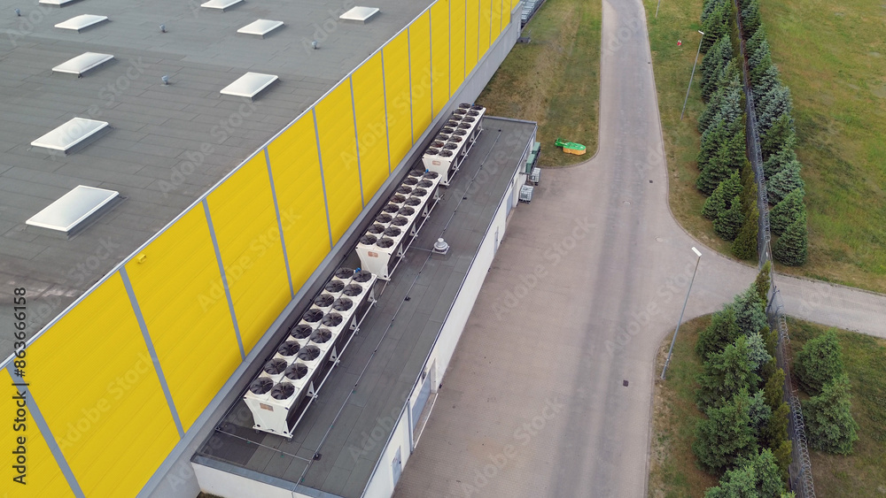 Fototapeta premium Commercial Building Roof with HVAC Heat Pump Systems
