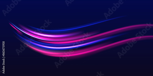 Long exposure of motorways as speed. Neon spiral lines in yellow blue and purple colors. Image of speed motion on the road.